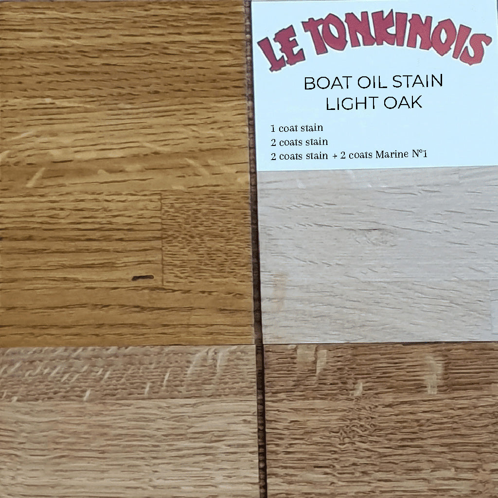 Close-up of a drawdown sample on a wooden surface showing the saturation of different coats of Le Tonkinois Boat Oil Stain in Light Oak.