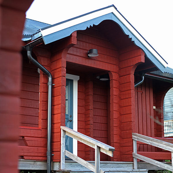 Red Pine Tar on a log house in Sweden.