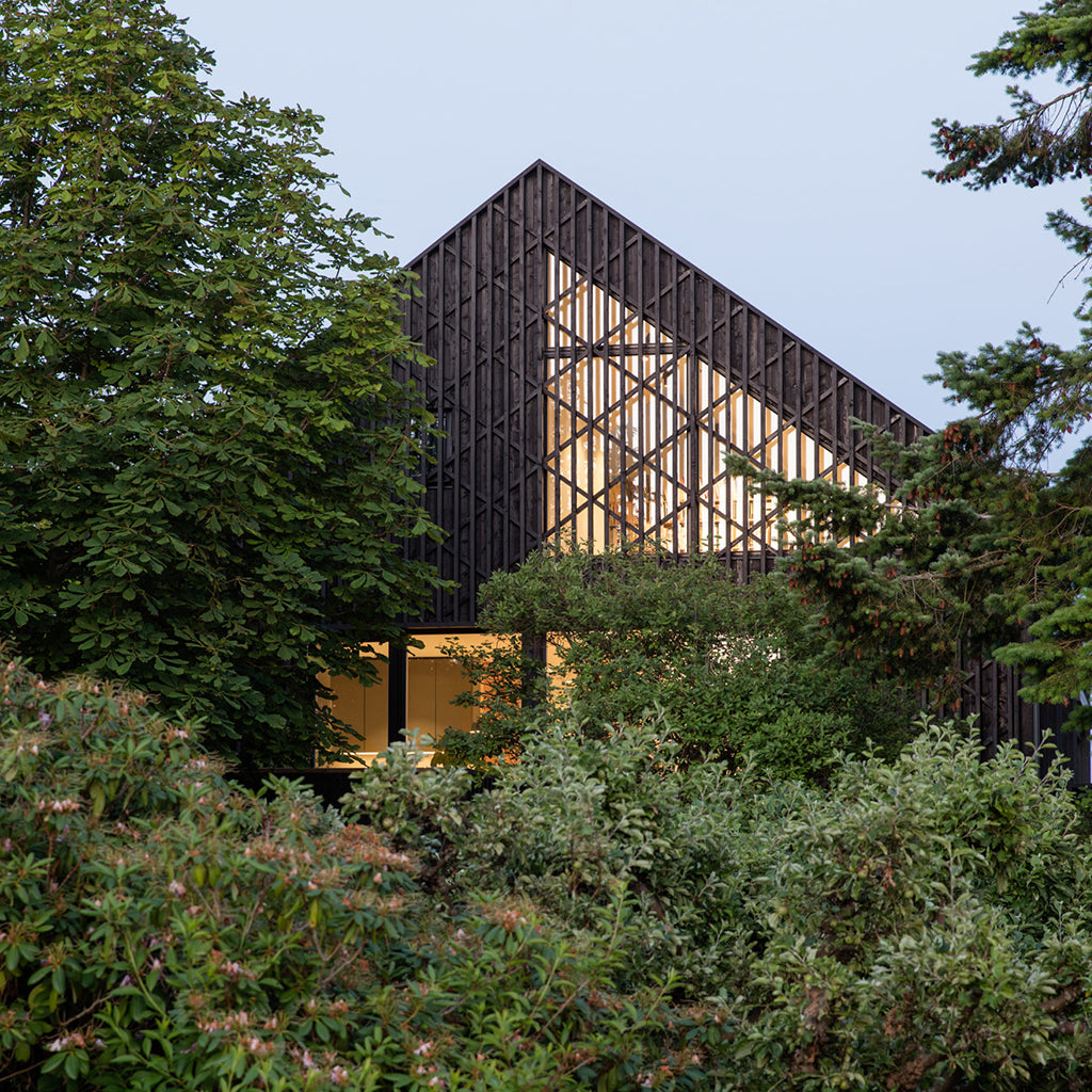 Black-Brown Pine Tar on this modern house a good alternative to Shou Sugi Ban technique.