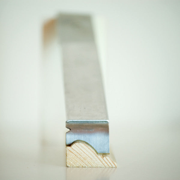 Sharpen your wood profile into the blade of the Little Scraper for Putty and Paint quickly and easily.