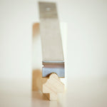 Sharpen your wood profile into the blade of the Little Scraper for Putty and Paint quickly and easily.