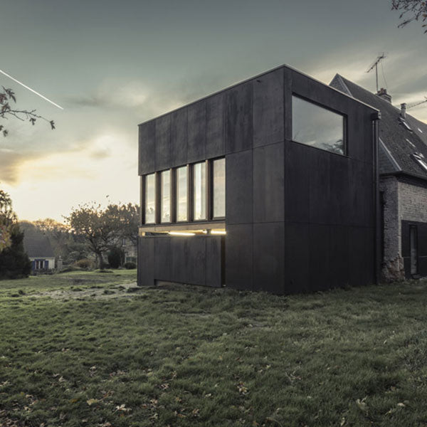 Black Pine Tar for modern addition on old limestone house.