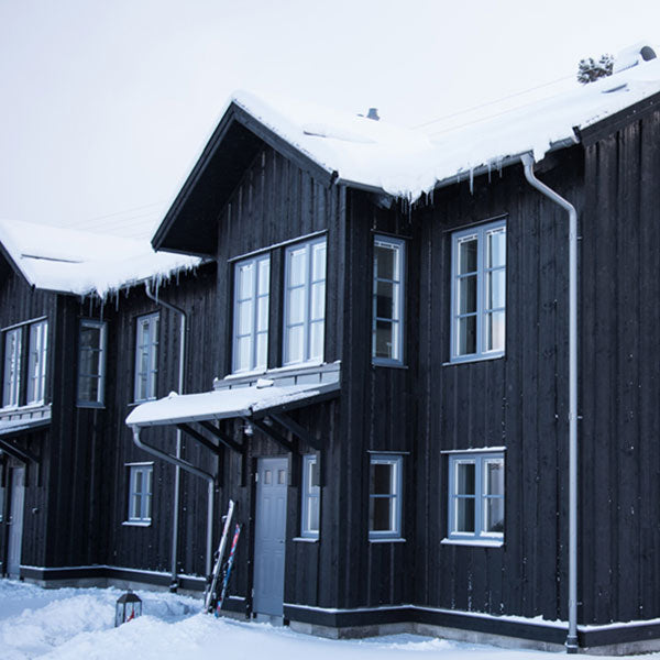 Black Pine Tar on ski lodge, Sweden.