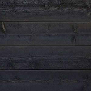 Black Pine Tar on wood.
