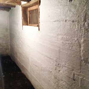 Hot mixed lime wash brightens a functioning farmhouse cellar and prevents mould and mildew on the walls.