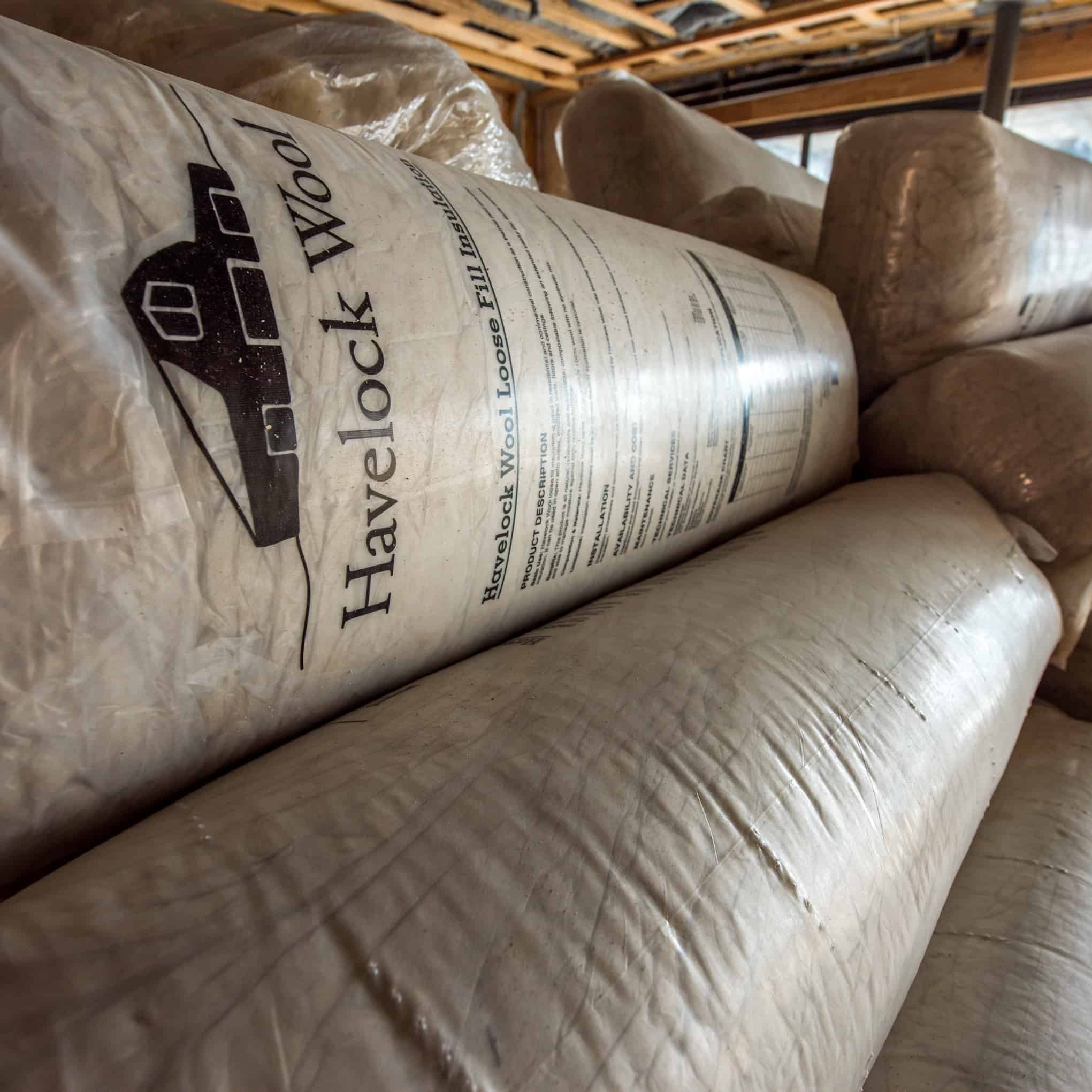 Havelock Wool loose-fill insulation comes compressed in bags for easy handling.